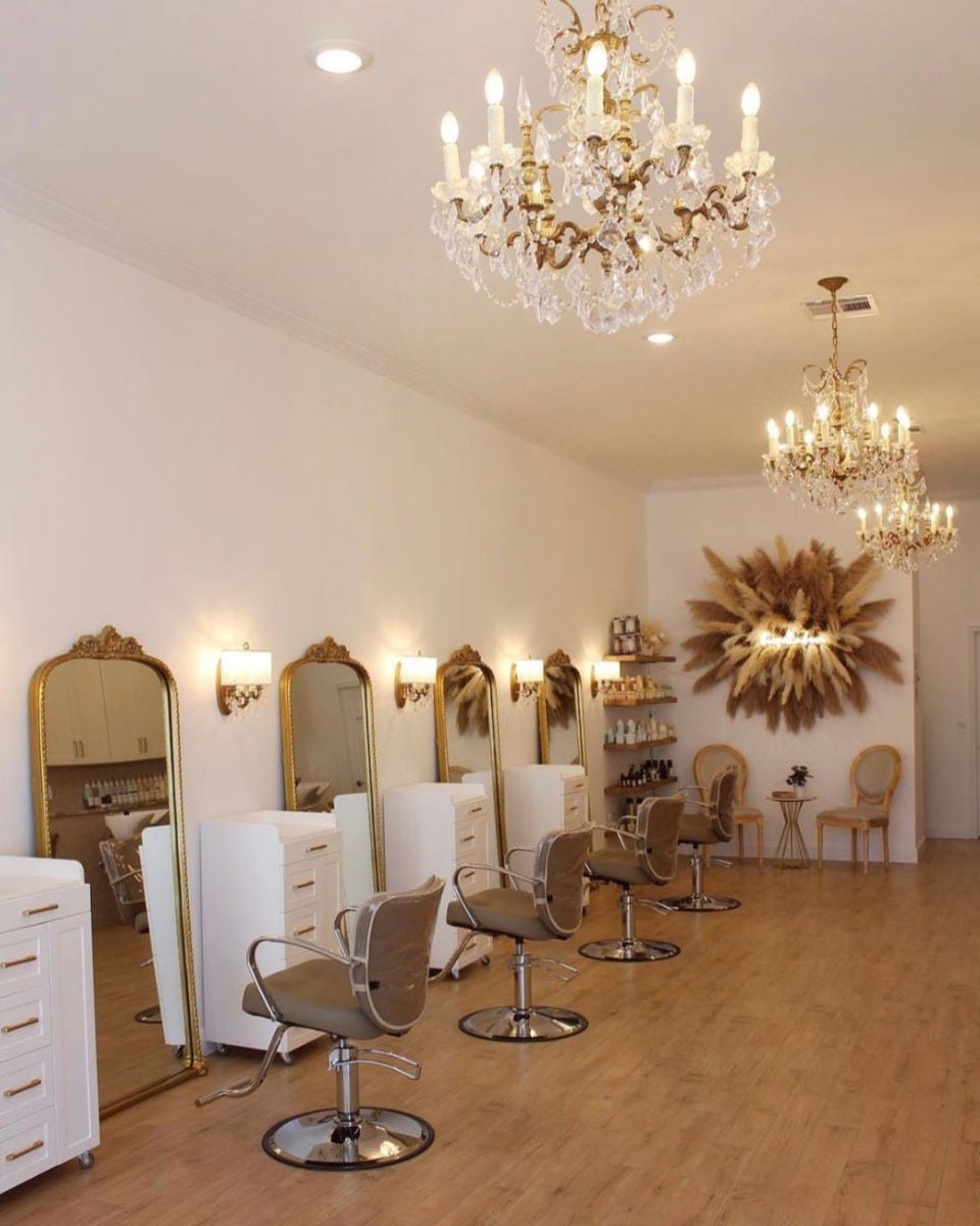 salon stations with 56 inches of space between each one