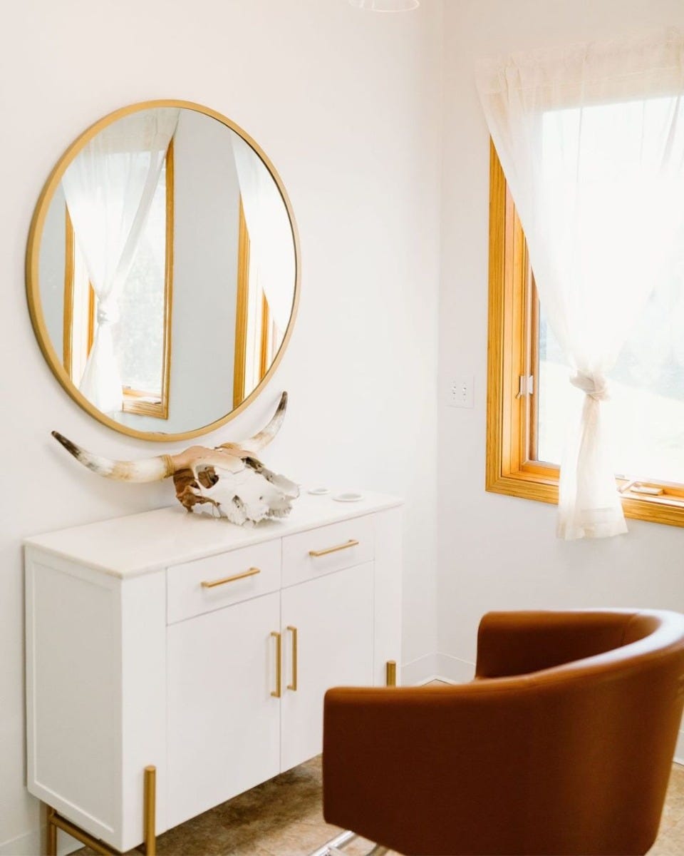 40-inch wide solid hardwood salon station with gold accents and round mirror