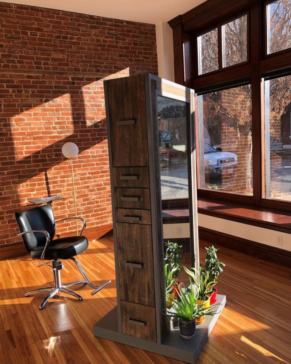 38.5-inch wide tower-style salon station with storage and full-length mirror in a new hair salon