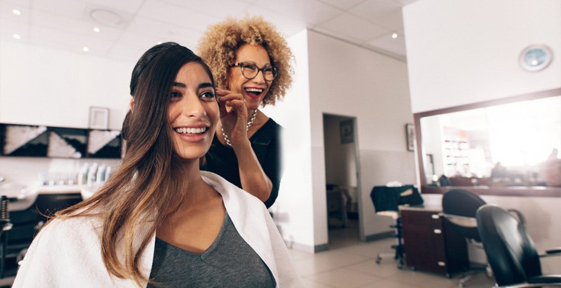 female hair dresser working