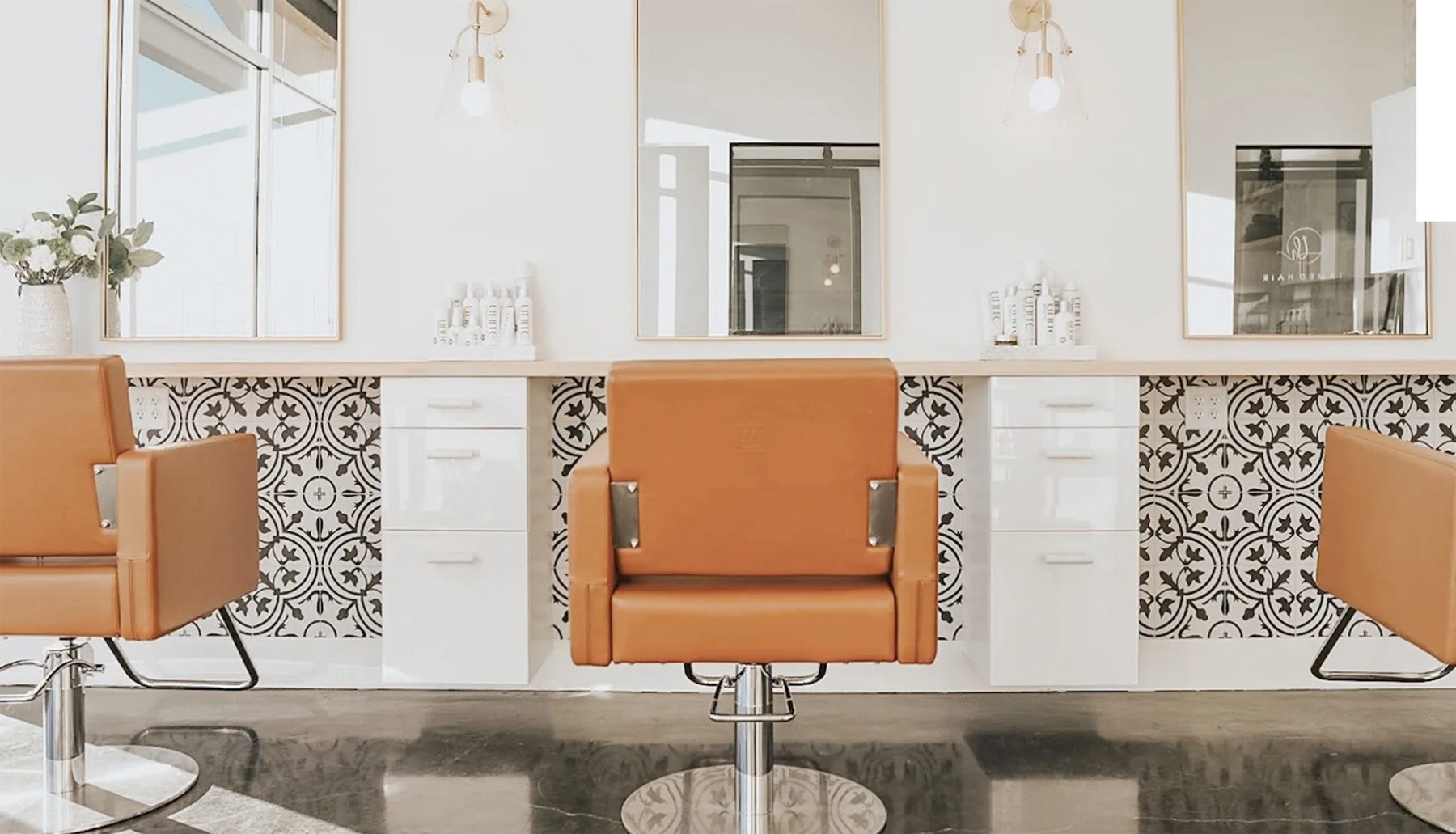 growing beauty business with client chairs, mirrors, storage carts and products